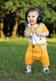 Little Boy With Headphones Smiling Royalty Free Stock Photography