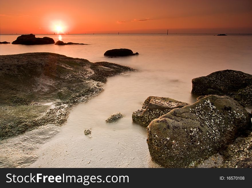 Sunset and soft sea in tropical zone