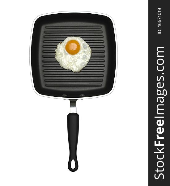 Fried egg on black non stick frying pan. Fried egg on black non stick frying pan