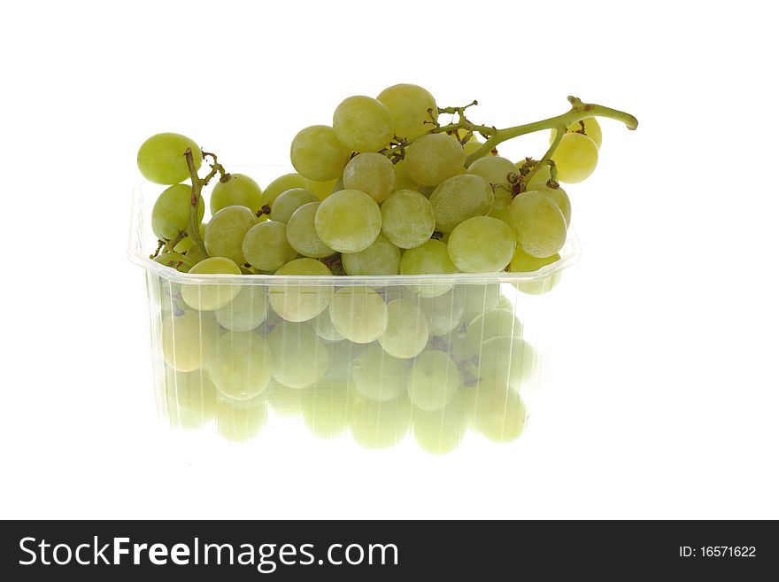 White grape cluster in box, isolated on white