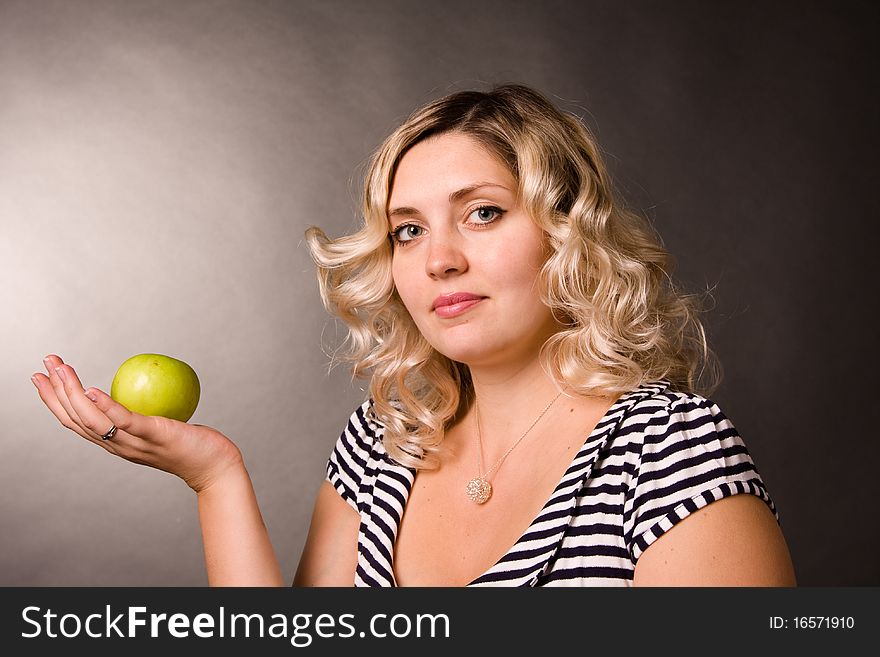 Photo of beautiful young woman of blonde with apples. Photo of beautiful young woman of blonde with apples.