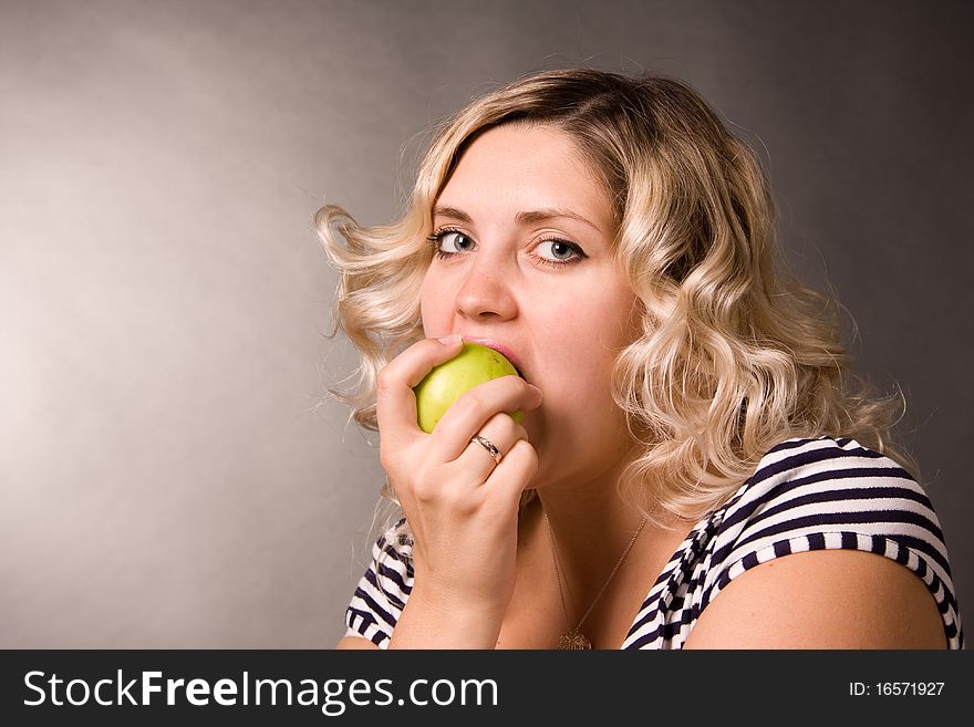 Photo of beautiful young woman of blonde with apples. Photo of beautiful young woman of blonde with apples.