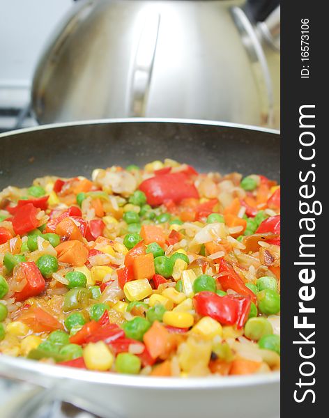 Roasting pan with vegetables in kitchen. Roasting pan with vegetables in kitchen