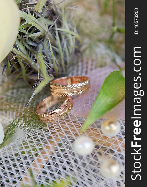 Gold wedding rings closeup shot