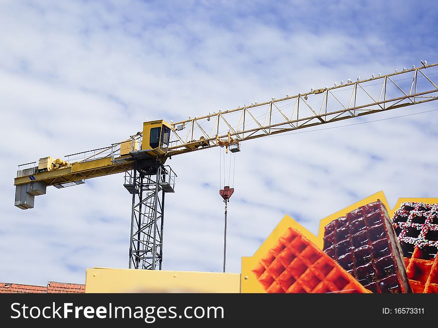 Crane on clouds background