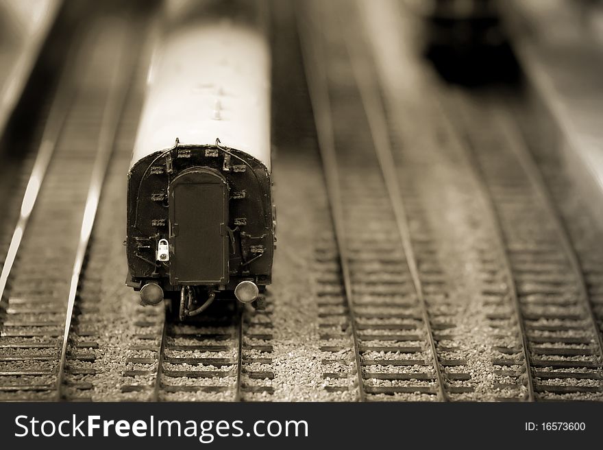 Miniature model train carriage macro with sepia tint. Miniature model train carriage macro with sepia tint