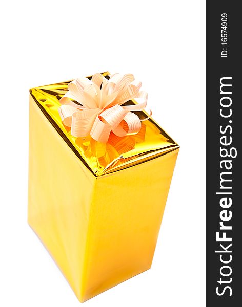 Single golden gift box isolated on white. Single golden gift box isolated on white