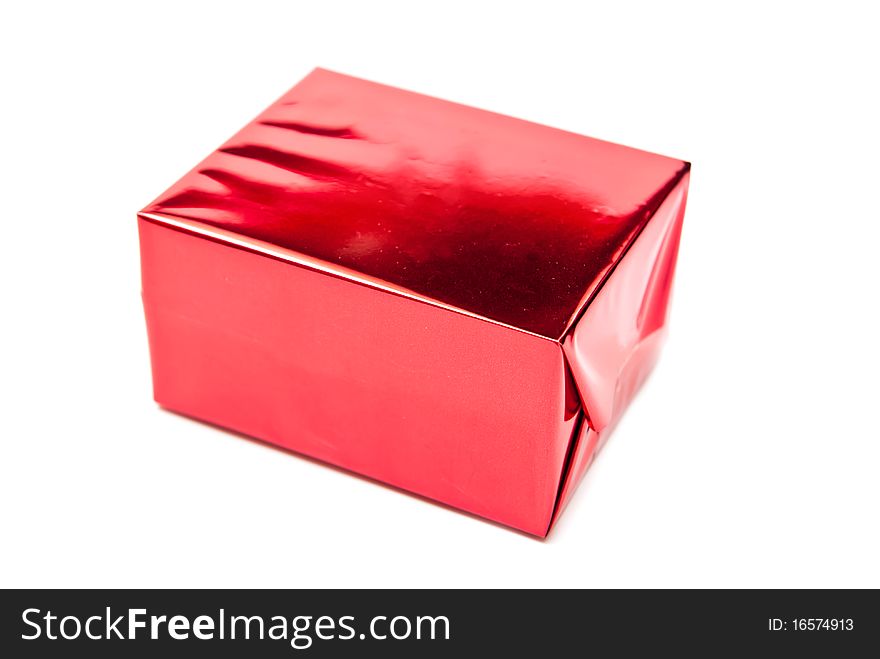 Single red present. Isolated on white background. Single red present. Isolated on white background