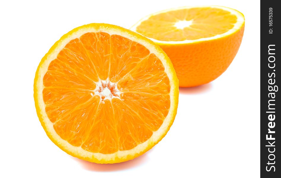 Ripe oranges on a white background