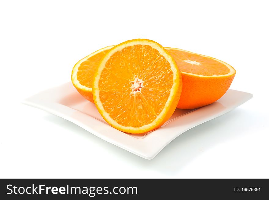 Ripe oranges on a white background