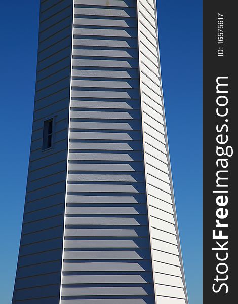 Overlapping timber cladding on a hexagonal lighthouse