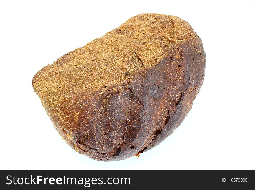 Black rye bread with the fried crust is isolated on a white background