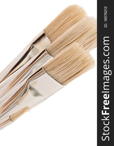 Close up of artist paint brushes with white background. Close up of artist paint brushes with white background.