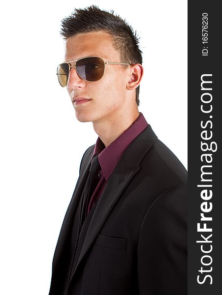 Young stylish businessman with sunglasses isolated over white background. Fresh trendy background. Young stylish businessman with sunglasses isolated over white background. Fresh trendy background.