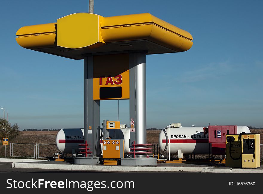 Station vehicle refueling. Gas fueling station. Station vehicle refueling. Gas fueling station.