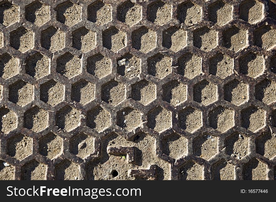 Metal texture in the form of honeycomb. Close-up, front.