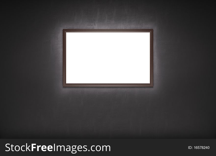 Empty picture illumination on the dark wall