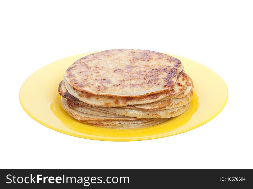 Pancakes on plate, isolated on white