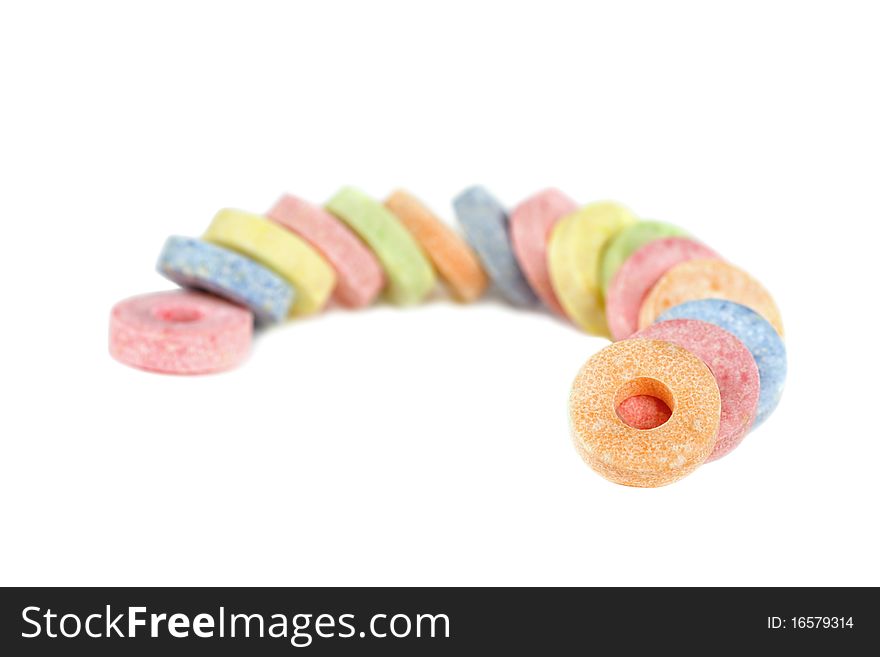 Multicolored vitamin candies isolated on white