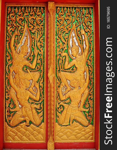 Ornate Thai Buddhist temple door located in yala thailand