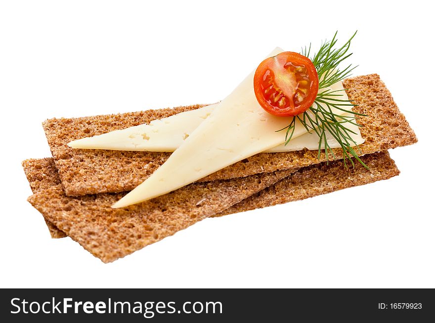 Crispbread with cheese, tomato and dill isolated on white. Healthy breakfast.