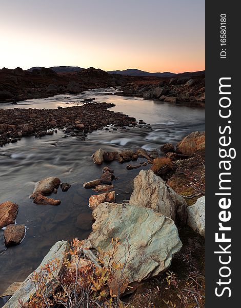 Swedish mountain stream in sunset