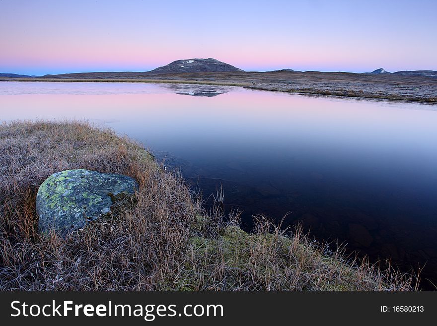 Mountain lake in early morning light