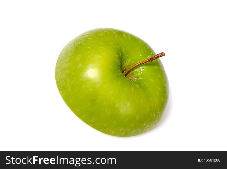 Fresh green apple cut into slices. isolated on white background