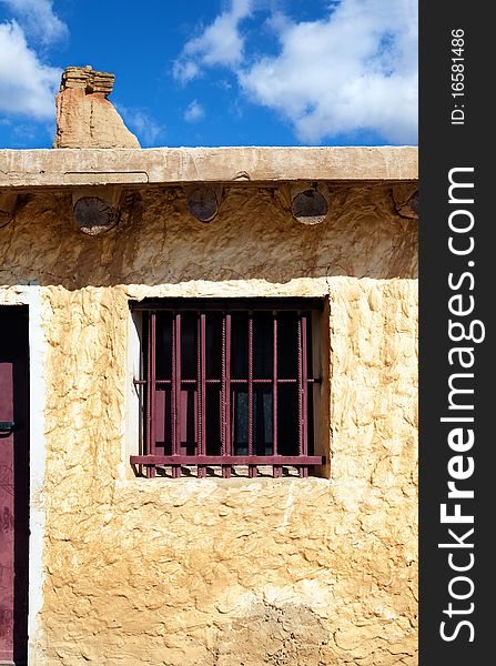 Close up image of sand house and blue sky. Close up image of sand house and blue sky