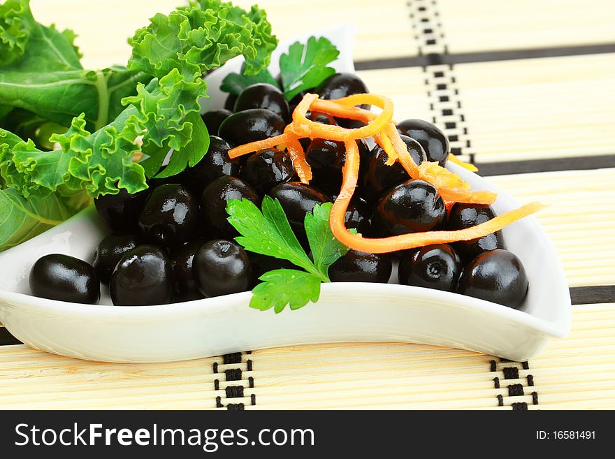 Marinated olives in a salad bowl