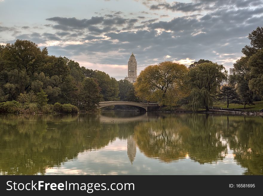 Early autumn in Central Park by the lake. Early autumn in Central Park by the lake