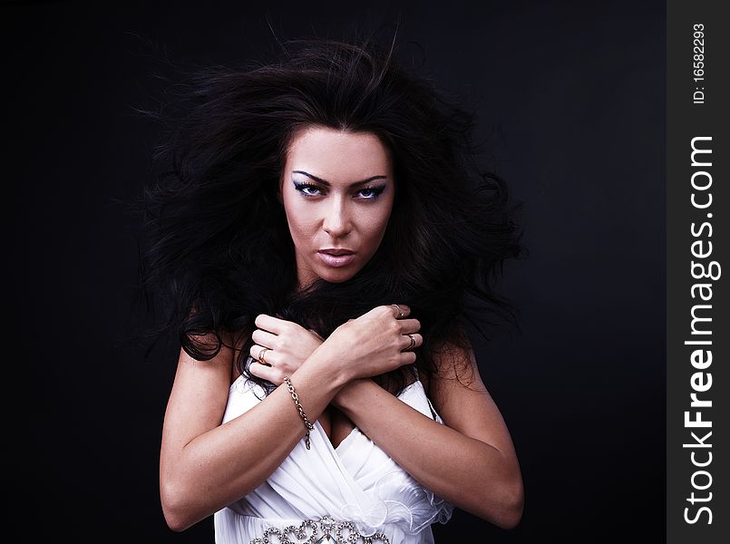 Black hair young woman portrait, studio shot