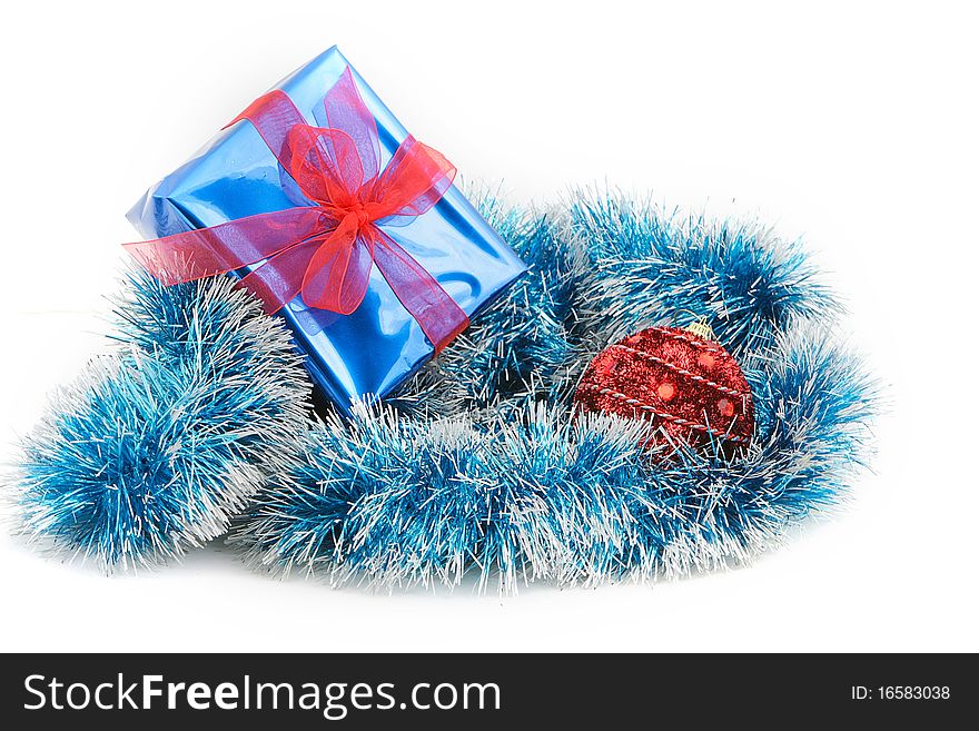 Studio shot of christmas decoration and gift box over white