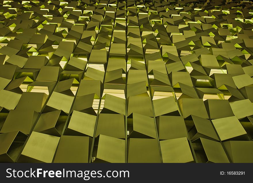 Image of hundreds of golden square blocks in random angles forming lines. Image of hundreds of golden square blocks in random angles forming lines