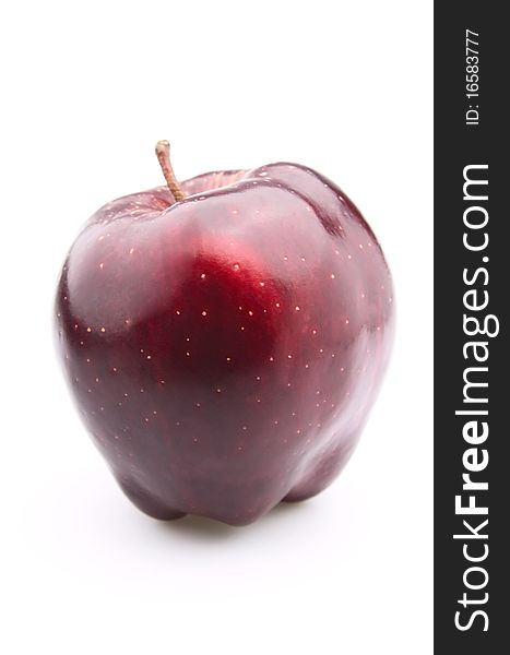 Red shining an apple on a white background. Red shining an apple on a white background
