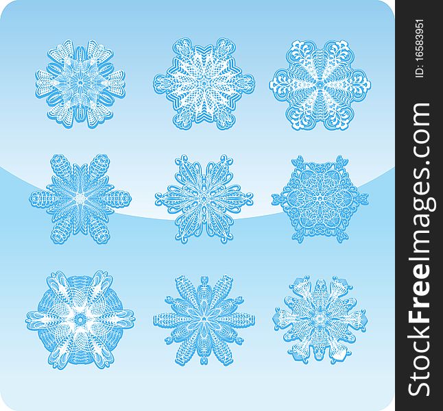 Set of graceful snowflakes on a blue background
