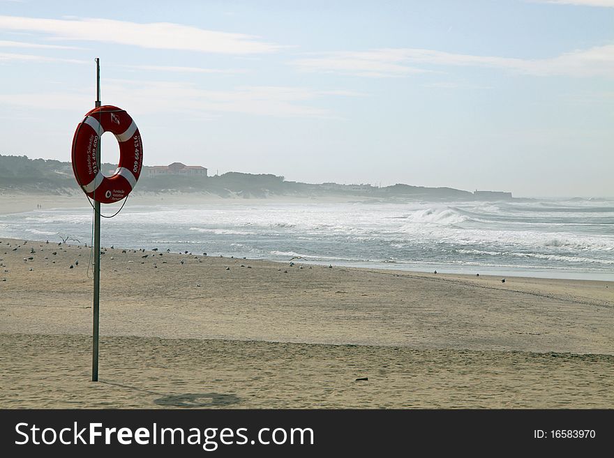 Lifebuoy on northen portuguese beach. Lifebuoy on northen portuguese beach