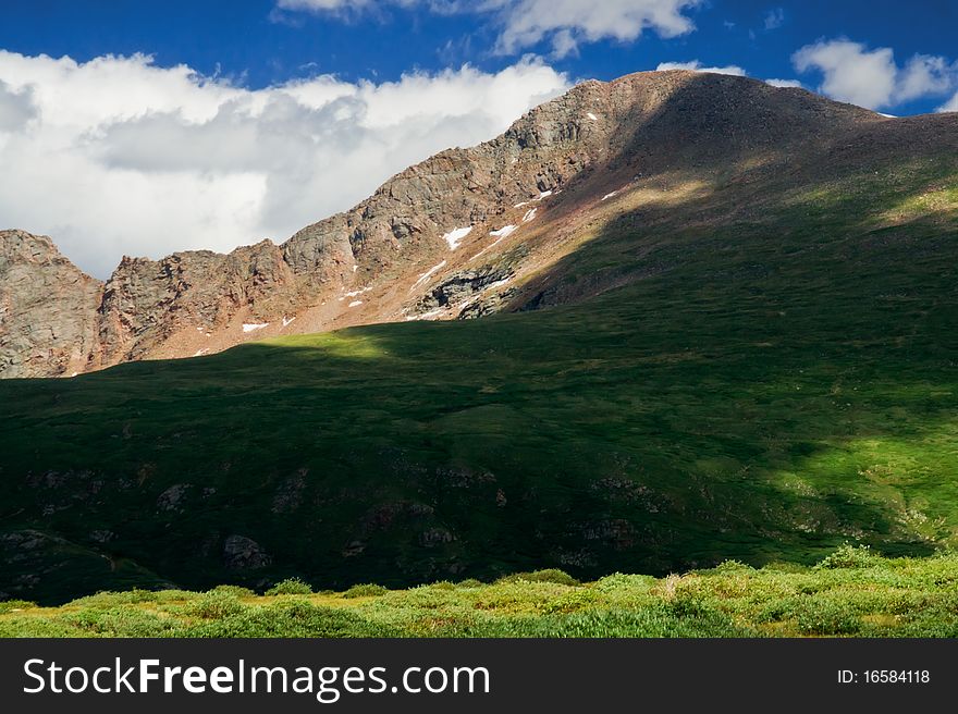 Rocky Mountains And Clouds