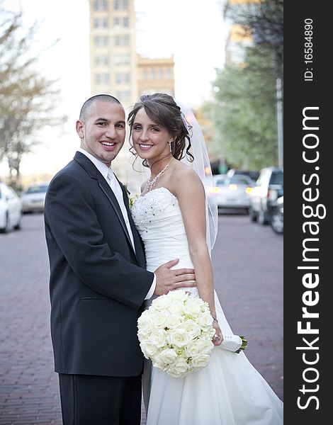 Vertical image of a bride and groom on their wedding day