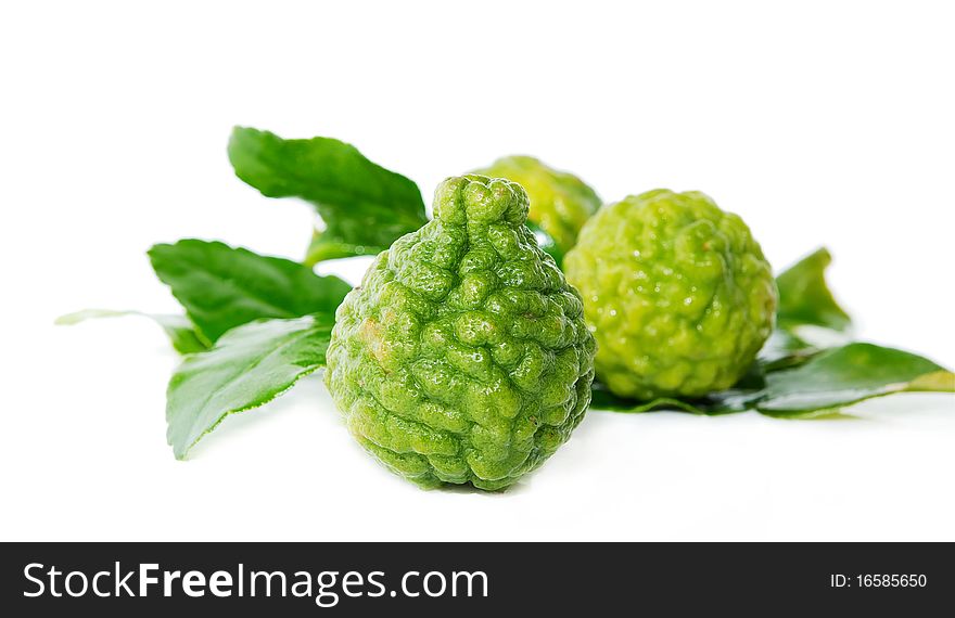 Fresh green lime. Kafir. Isolated over white