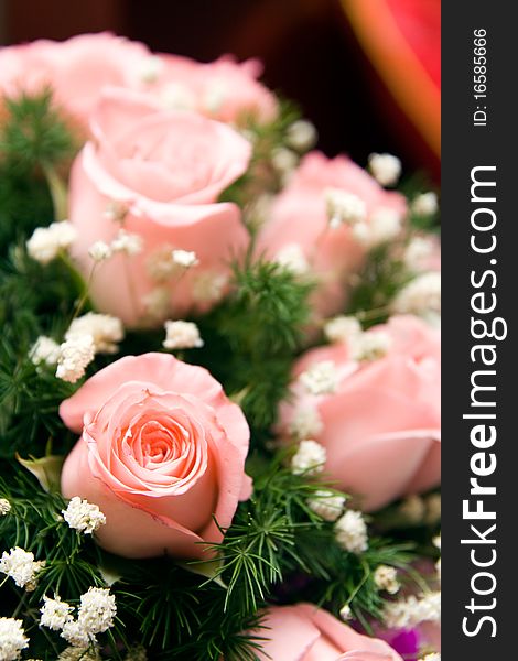 A beautiful bunch of pink roses in wedding. A beautiful bunch of pink roses in wedding