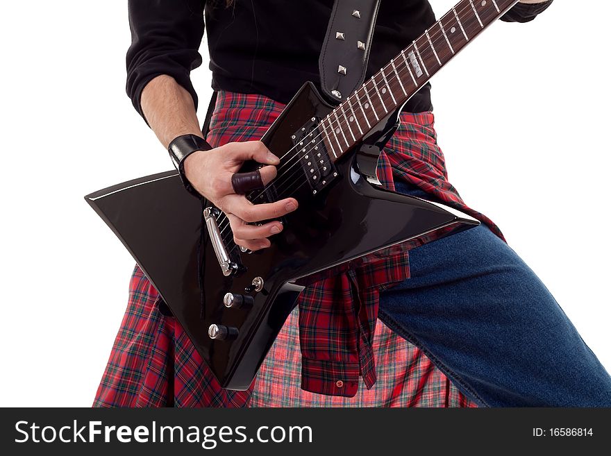 Close up of an electric guitar being played.