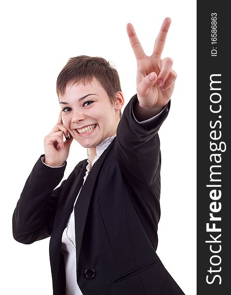 Happy business woman with phone and victory gesture, isolated