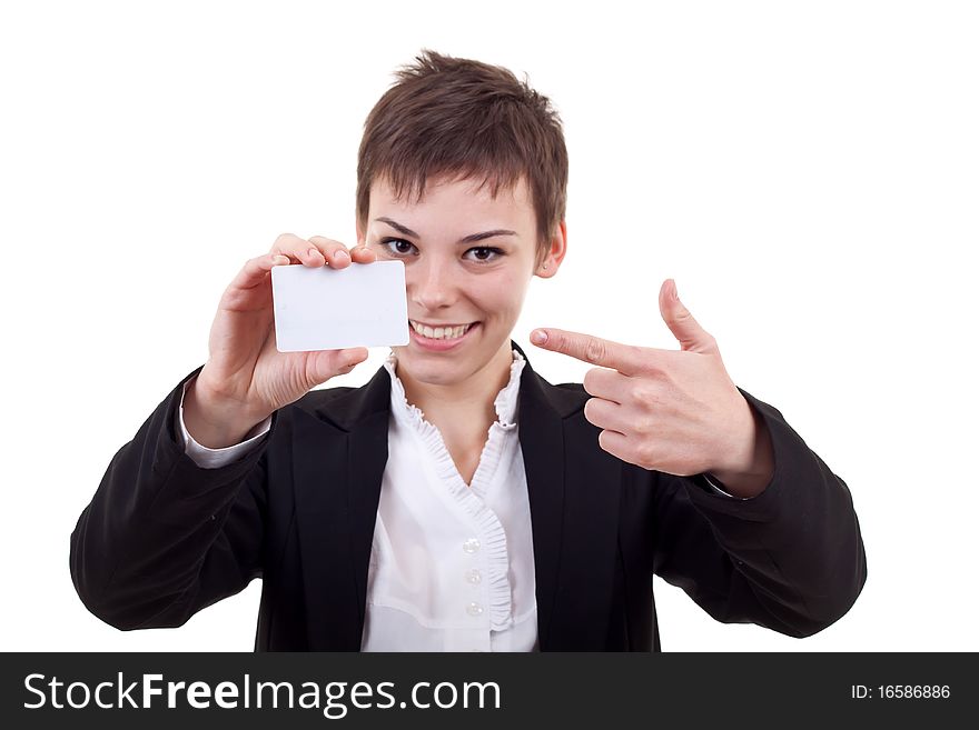 Image of pretty business woman holding a white business card pointing to it. Image of pretty business woman holding a white business card pointing to it