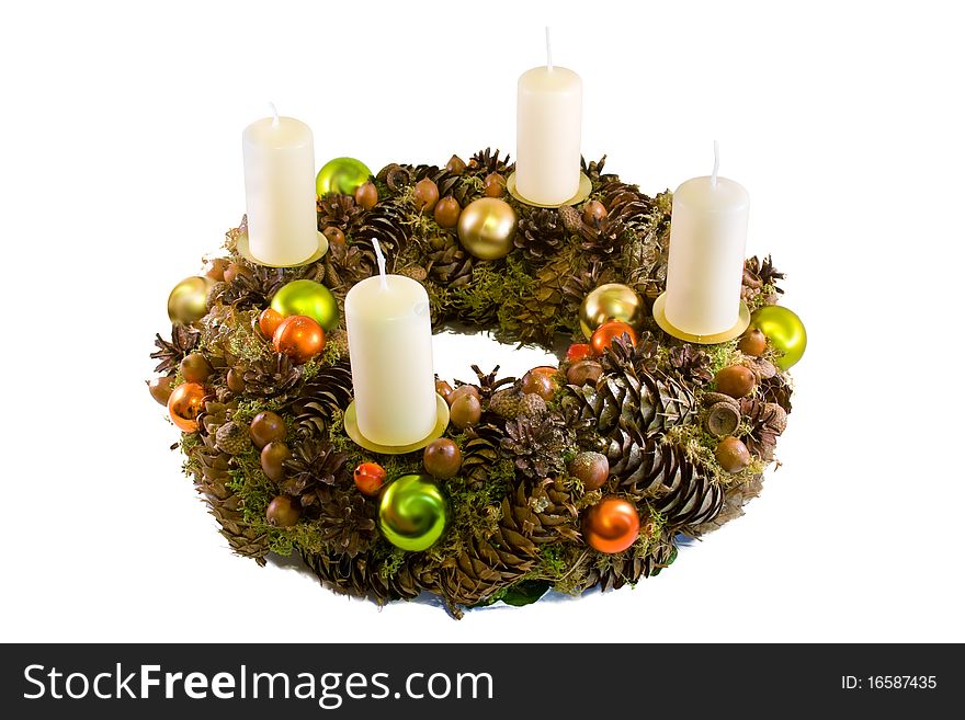 Christmas wreath with four candles isolated on white background