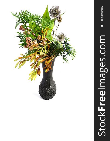 Autumn bouquet in a black vase on a white background