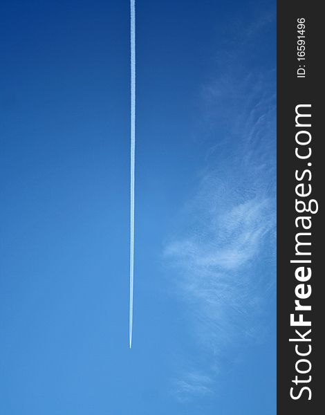 Airplane Contrail In The Sky