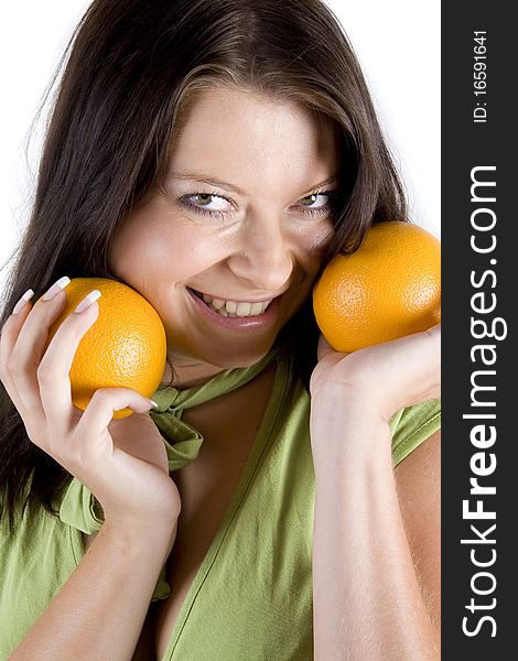 Young girl with citrus fruits on white background