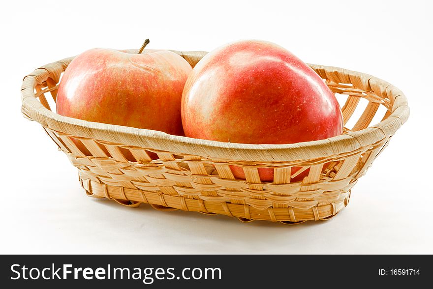 Apples in a wicker basket. Apples in a wicker basket