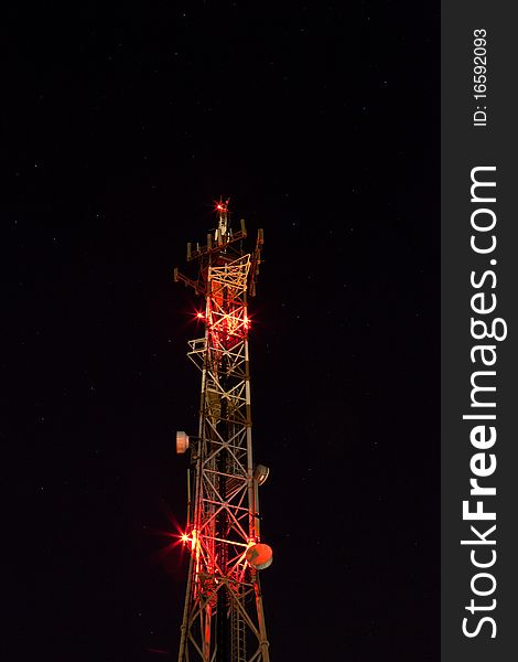 Light Electric Tower in the night with the stars